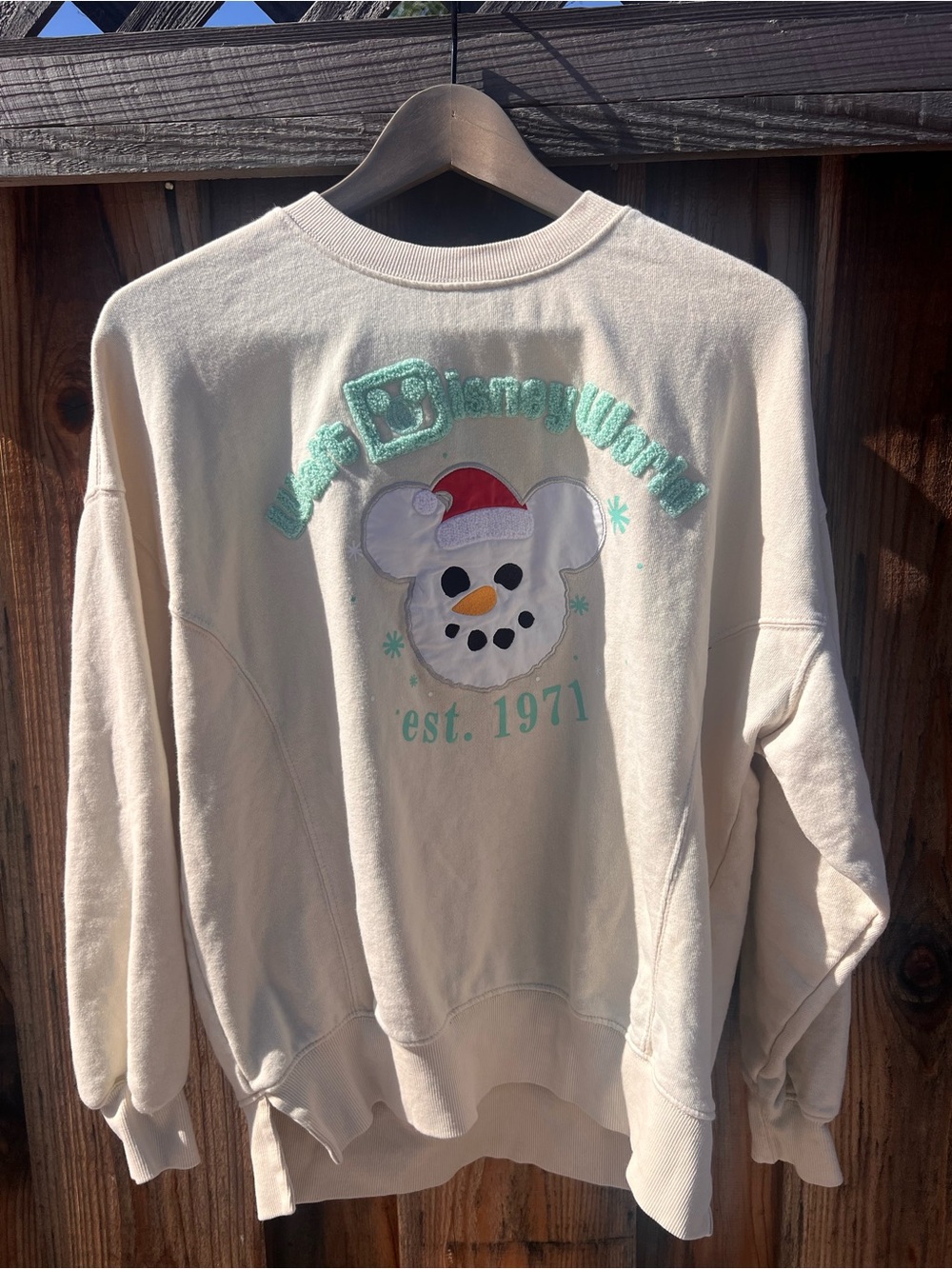 Disney Cream Crewneck Sweatshirt with Mint and Red Snowman Motif